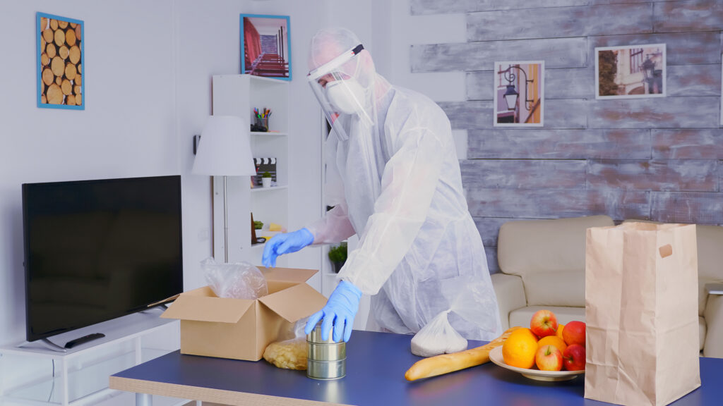 A professional technician reviewing a digital HACCP logbook for a pest control for restaurants in Ireland.